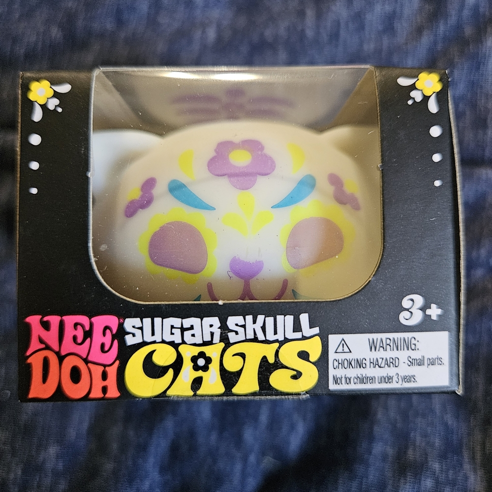 NeeDoh Sugar Skull Cats Squishy Toy - White with Yellow, Purple & Teal Accents